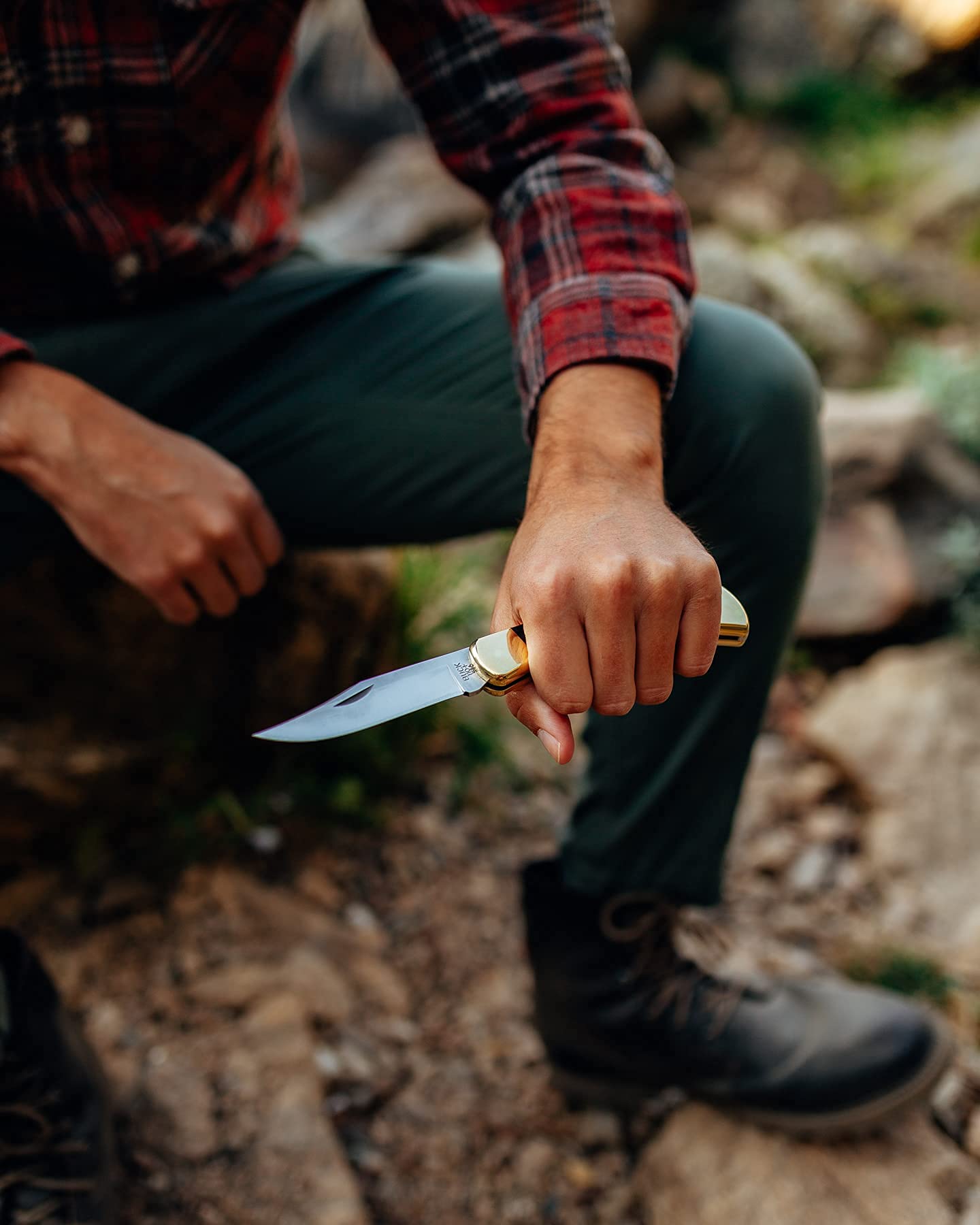 Buck Knives 110 Folding Hunter Knife, 3-3/4" Blade, Lockback Design, Ebony Handle, Brass Bolsters, 420HC Stainless Steel Clip Point Blade, Sheath Included, Hunting Knife Made in the USA, 7.2 oz