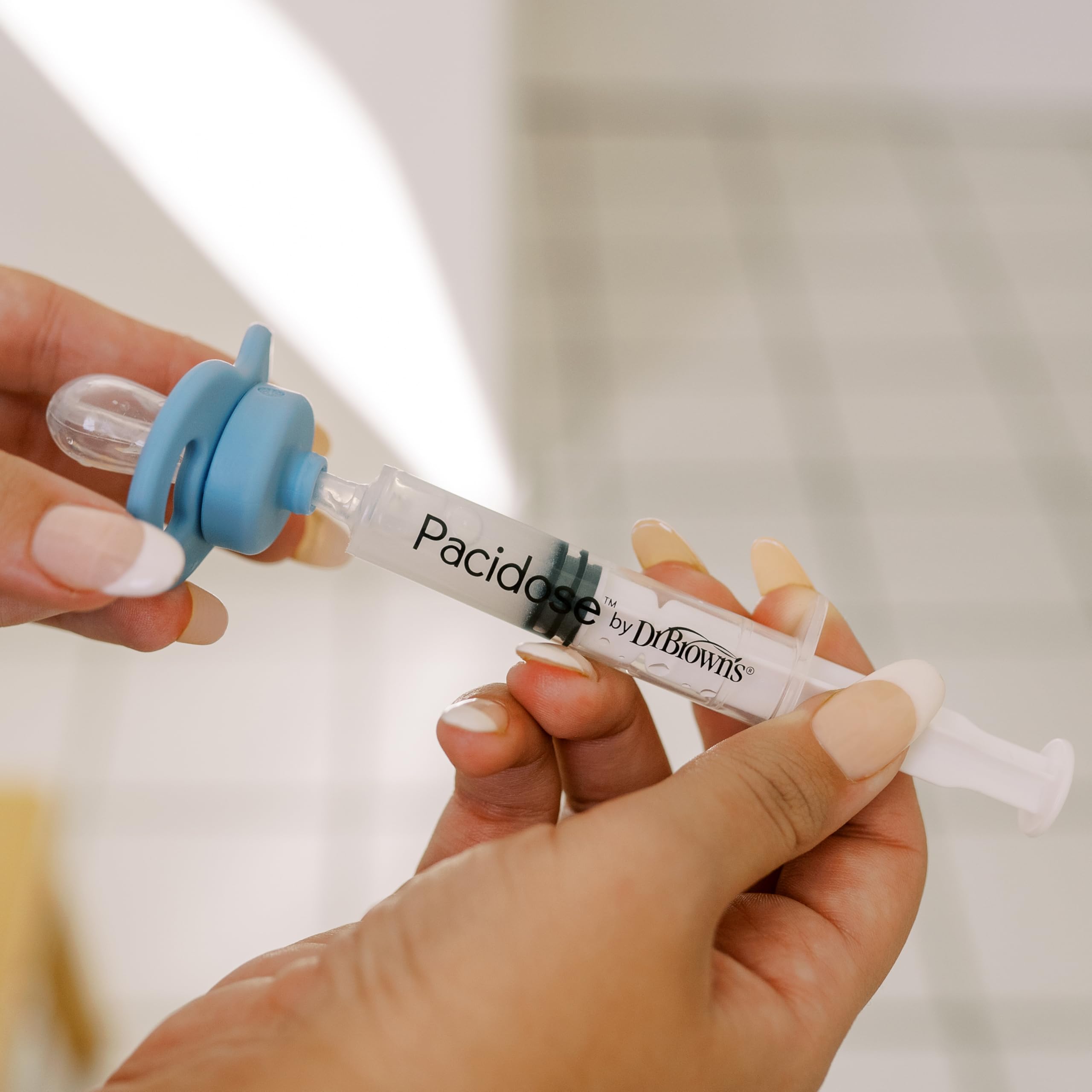 Dr. Brown's Pacidose Pacifier and Liquid Baby Medicine Dispenser with Oral Syringe and Two Sizes of Pacifier Bulbs - 0-6m and 6-18m